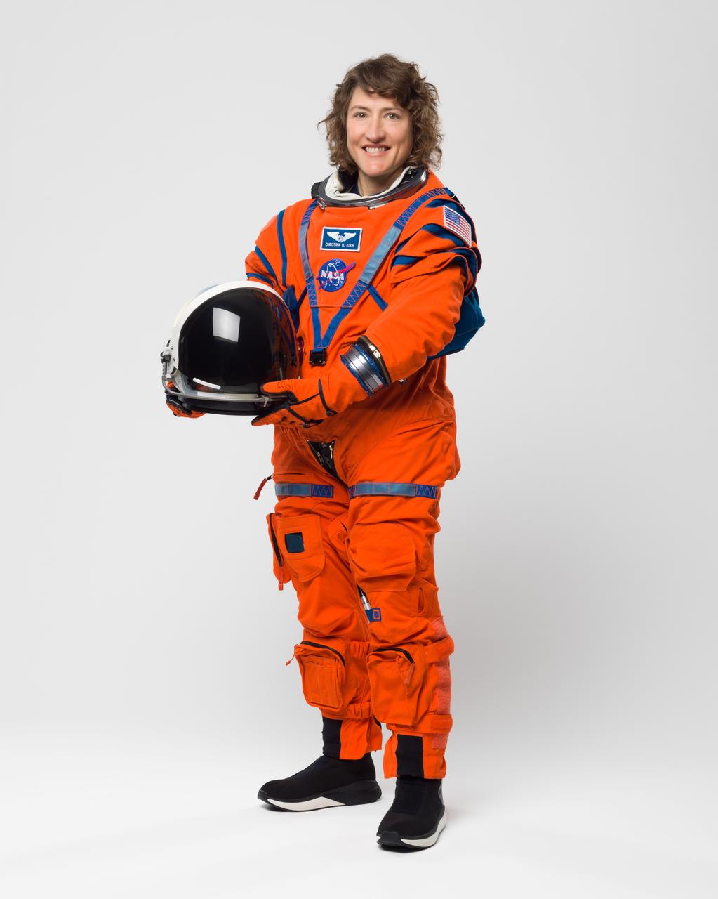 NASA Astronaut Christina Hammock Koch will be making her second flight to space on the Artemis II mission, serving as a mission specialist. Koch served as flight engineer aboard the space station for Expedition 59, 60, and 61. Koch set a record for the longest single spaceflight by a woman with a total of 328 days in space and participated in the first all-female spacewalks.