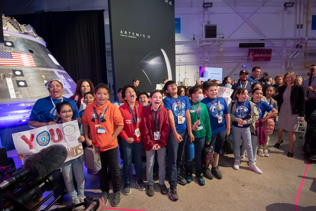 jsc2023e017940 (April 3, 2023) – Houston students from Davila Elementary and Wesley Elementary attend the Monday, April 3, 2023, announcement of the Artemis II crew at Ellington Field near NASA’s Johnson Space Center. The crew is comprised of Commander Reid Wiseman, Pilot Victor Glover, and Mission Specialists Christina Koch and Jeremy Hansen. The four astronauts will venture around the Moon on Artemis II, the first crewed mission on NASA’s path to establishing a long-term presence at the Moon for science and exploration through Artemis.