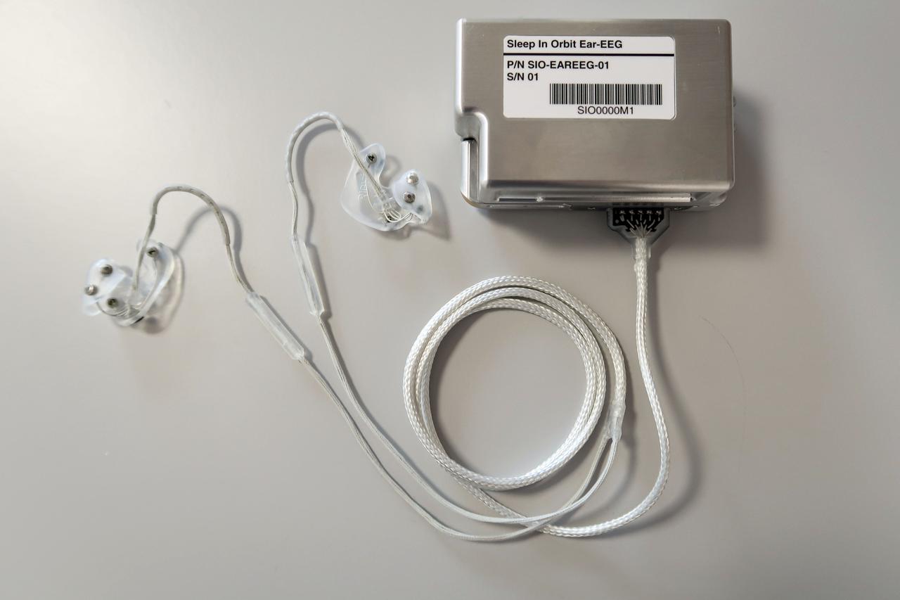 jsc2023e031742 (2/20/2023) --- Long-term Sleep Monitoring Before, During and After Extended Spaceflight (Sleep in Orbit) ear-EEG (electroencephalography) hardware. The Sleep in Orbit investigation studies the physiological differences between sleep on Earth and in space using ear-EEG (electroencephalography) based sleep monitoring. Image courtesy of Preben Kidmose.