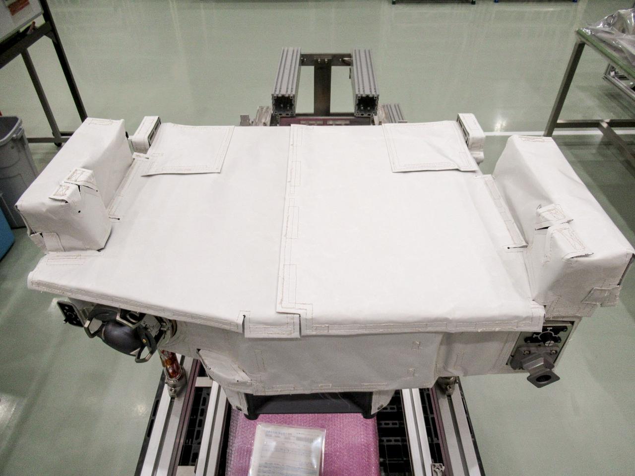 jsc2023e031749 (2/4/2022) --- Preflight image of IVA-replaceable Small Exposed Experiment Platform 3B (i-SEEP3B)—payload attached plate with Multi Layer Insulation (MLI). Image courtesy of JAXA and IHI-Aerospace.