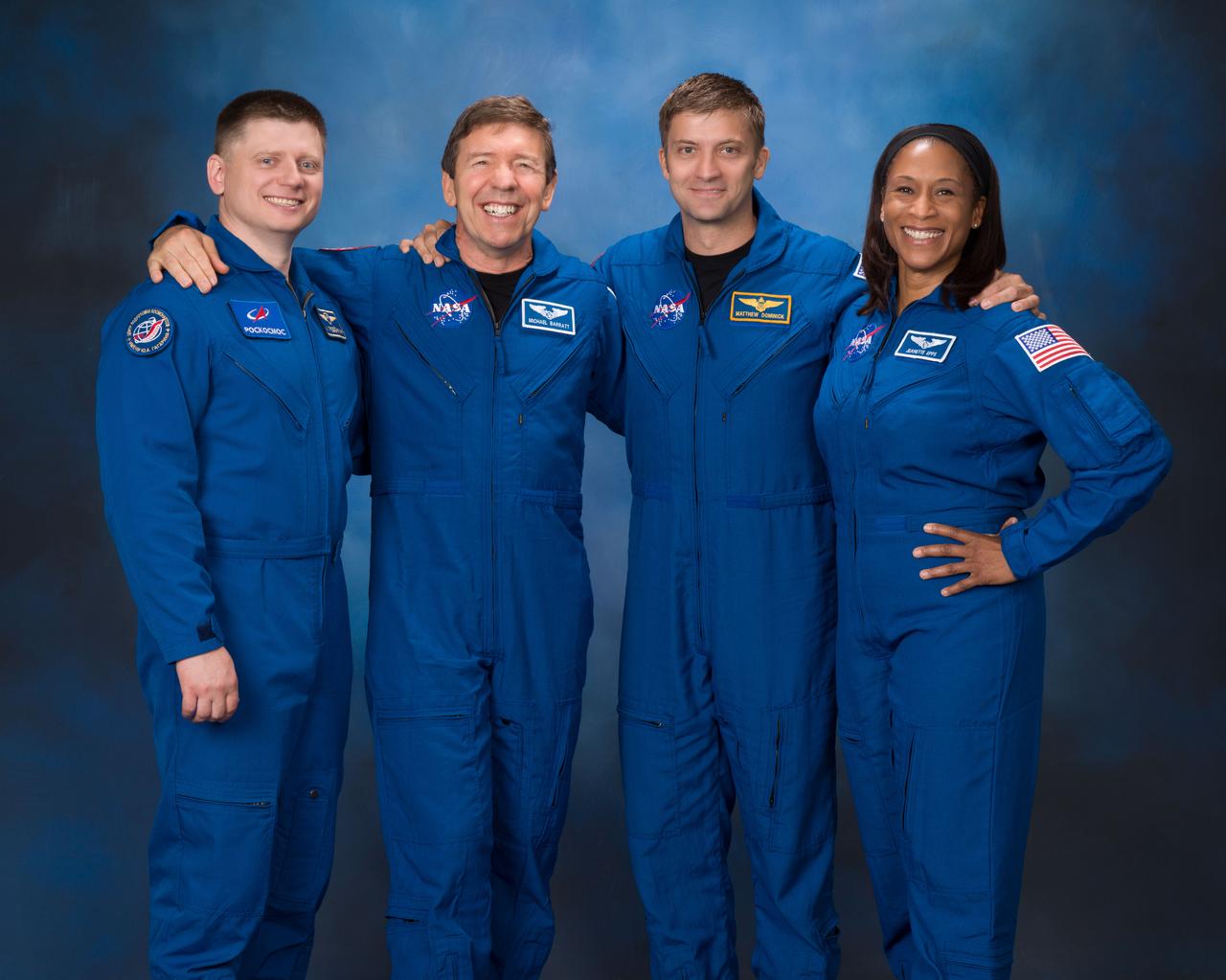 jsc2023e047424_alt (Aug. 3, 2023) --- The four crew members representing the SpaceX Crew-8 mission to the International Space Station pose for an official portrait at the Johnson Space Center in Houston, Texas. From left, are Mission Specialist Aleksandr Grebenkin from Roscosmos, and Pilot Michael Barratt, Commander Matthew Dominick, and Mission Specialist Jeanette Epps, all from NASA.