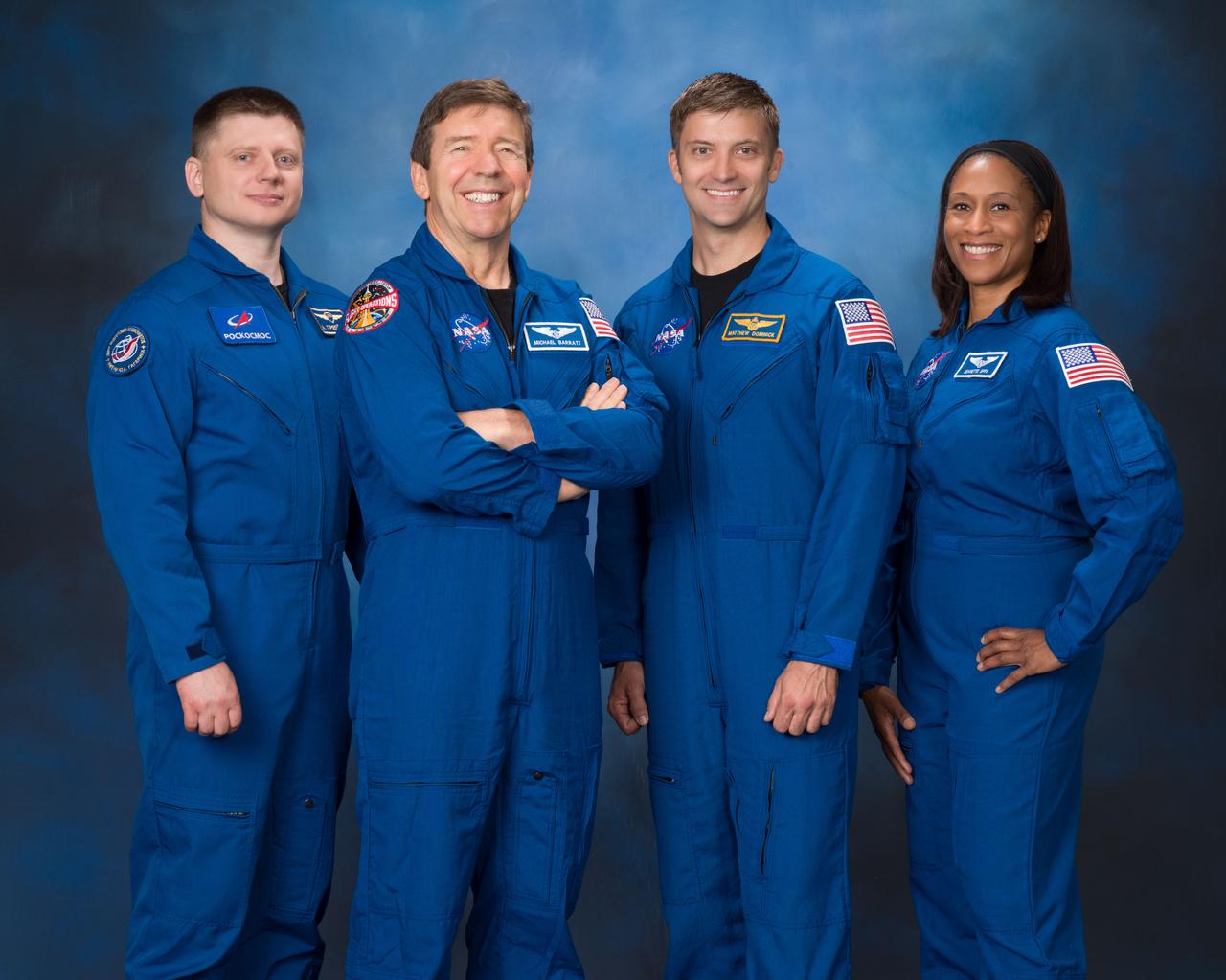 jsc2023e047425_alt (Aug. 3, 2023) --- The four crew members representing the SpaceX Crew-8 mission to the International Space Station pose for an official portrait at the Johnson Space Center in Houston, Texas. From left, are Mission Specialist Aleksandr Grebenkin from Roscosmos, and Pilot Michael Barratt, Commander Matthew Dominick, and Mission Specialist Jeanette Epps, all from NASA.