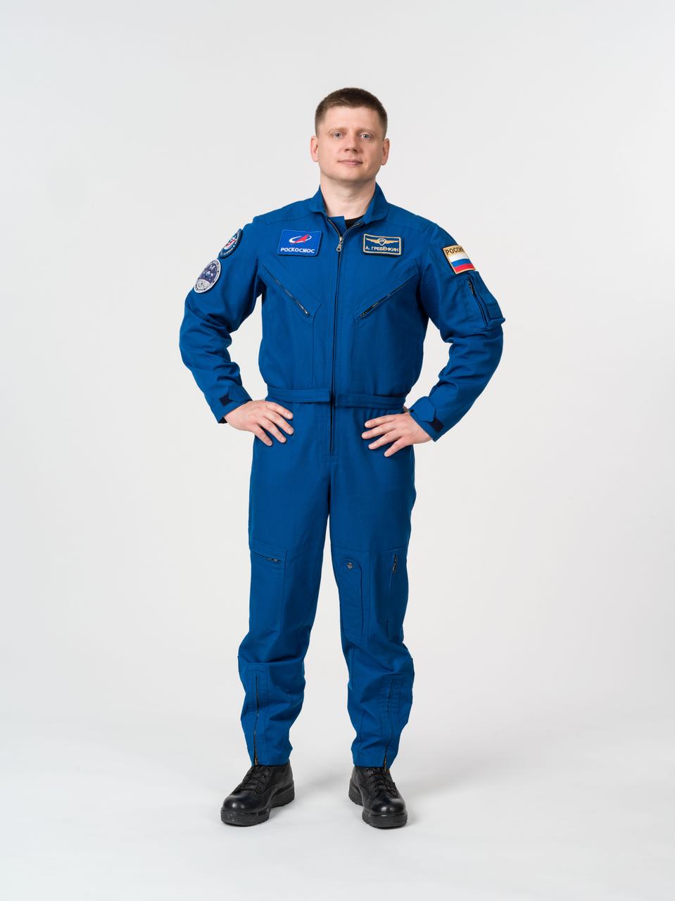 jsc2023e047815_alt (Nov. 16, 2023) --- Roscosmos cosmonaut and SpaceX Crew-8 Mission Specialist Aleksandr Grebenkin poses for a portrait at NASA's Johnson Space Center in Houston, Texas.  Credit: NASA/Bill Stafford
