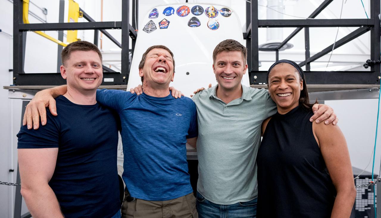 jsc2023e050367 (Aug. 10, 2023) --- Crew-8 poses for a group photo after completing its first full week of training at SpaceX in Hawthorne, California. From left, are Mission Specialist Aleksandr Grebenkin from Roscosmos, and Pilot Michael Barratt, Commander Matthew Dominick, and Mission Specialist Jeanette Epps, all from NASA. Credit: SpaceX