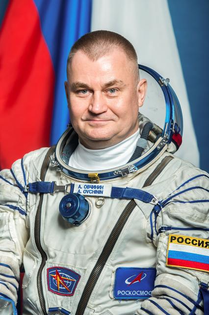 NASA image: Soyuz MS-26 Commander Alexey Ovchinin poses for a crew portrait