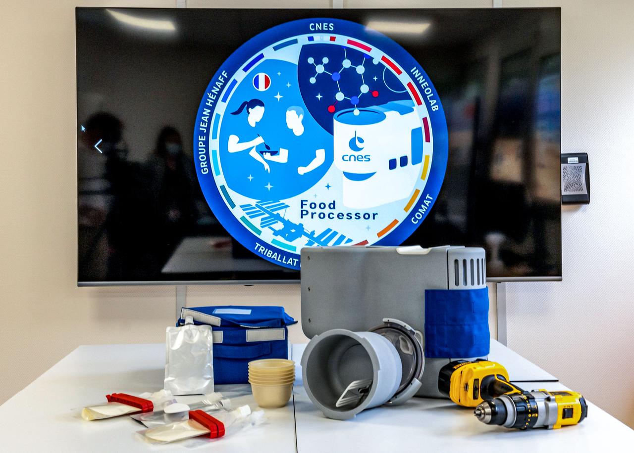 jsc2023e054754 (6/23/2021) --- A preflight view of the Food Processor Instrument and consumables including the drill it will need to use on board the International Space Station (ISS). The objective of the Advanced System for Space Food (Food Processor) investigation on board the International Space Station is to test a prototype equipment demonstrator with one specific recipe that uses basic cooking functions (beating egg whites, mixing products).  © CNES/DE PRADA Thierry, 2021.