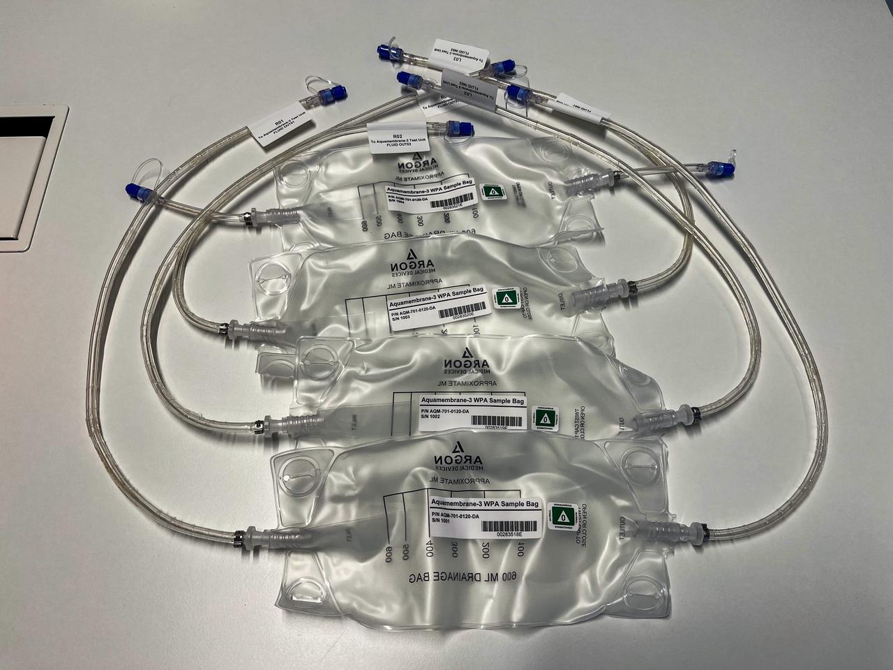 jsc2023e055874 (10/5/2023) --- The Testing Contaminant Rejection of Aquaporin Inside® HFFO Module (Aquamembrane-3) hardware consists of three separate and parallel systems to quantify the membrane's water flux and contamination rejection in microgravity, which are key parameters for a full water recovery system. This image shows the bags in which samples of the ISS WPA are collected for the experiment.