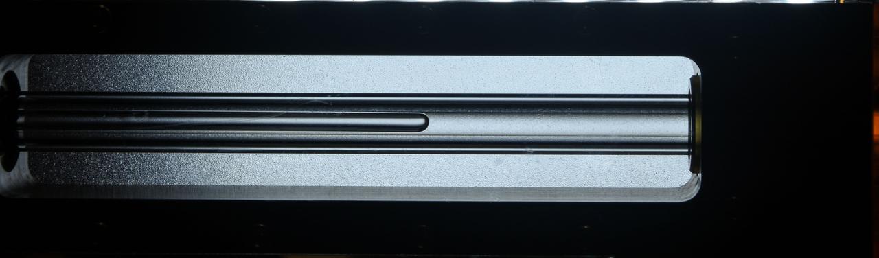 jsc2023e055883 (10/5/2023) --- Oil is pushed back into the reservoir by a jet of air during the reset phase of the investigation. As the oil moves back into the reservoir, it leaves behind a thin liquid film. The Gaucho Lung investigation will study fluid transport within gel-coated tubes to learn more about treatment programs for respiratory distress syndrome and develop new contamination control strategies. Image courtesy of University of California, Santa Barbara.