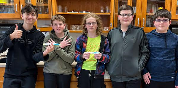 jsc2023e065190 (19/19/2023) --- Iroquois SSEP student researchers work on their crystallization experiment, which will be included in the Nanoracks-National Center for Earth and Space Science Education-Orbiter-Student Spaceflight Experiments Program Mission 17 to ISS (Nanoracks-NCESSE-Orbiter-SSEP).