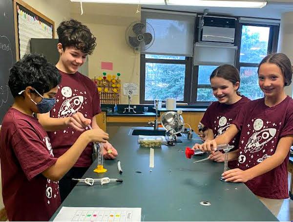 jsc2023e065191 (10/19/2023) --- Garden City Middle School student researchers work on their dill seed germination experiment, which will be included in the Nanoracks-National Center for Earth and Space Science Education-Orbiter-Student Spaceflight Experiments Program Mission 17 to ISS (Nanoracks-NCESSE-Orbiter-SSEP).