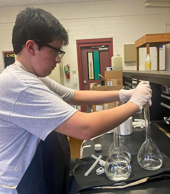 jsc2023e065200 (10/19/2023) --- Student researcher Sam Dondapati work on his experiment, Growth of Spirulina in Microgravity, which will be included in the Nanoracks-National Center for Earth and Space Science Education-Orbiter-Student Spaceflight Experiments Program Mission 17 to ISS (Nanoracks-NCESSE-Orbiter-SSEP).