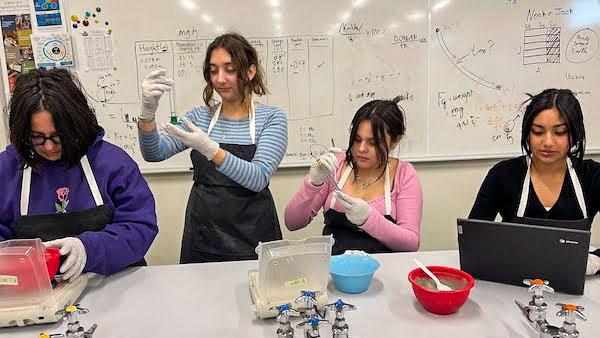 jsc2023e065206 (1/26/2023) --- Canyon Spring student researchers work on their experiment, which will be included in the Nanoracks-National Center for Earth and Space Science Education-Orbiter-Student Spaceflight Experiments Program Mission 17 to ISS (Nanoracks-NCESSE-Orbiter-SSEP).