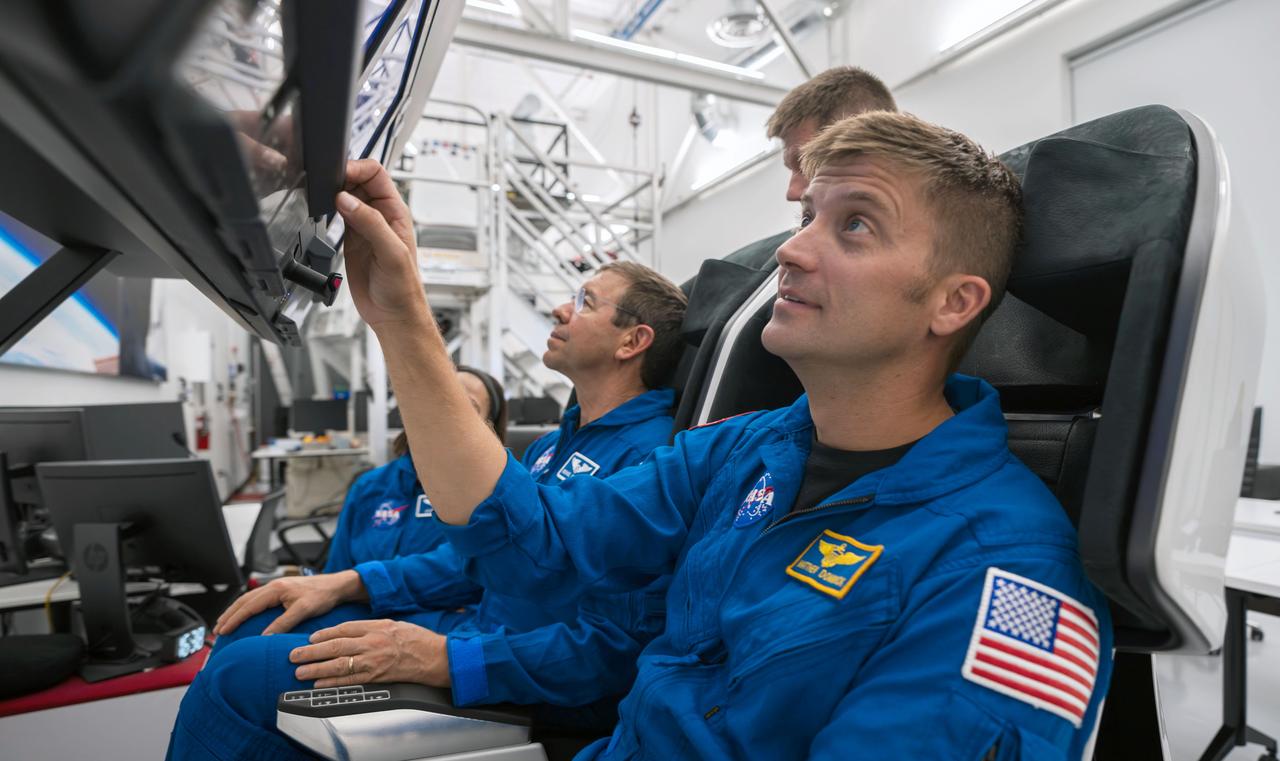 jsc2023e066246 (Oct. 15, 2023) --- SpaceX Crew-8 crew members (from left) Michael Barratt and Matthew Dominick, both NASA astronauts, are pictured during a training session at SpaceX headquarters in Hawthorne, California. Credit: SpaceX