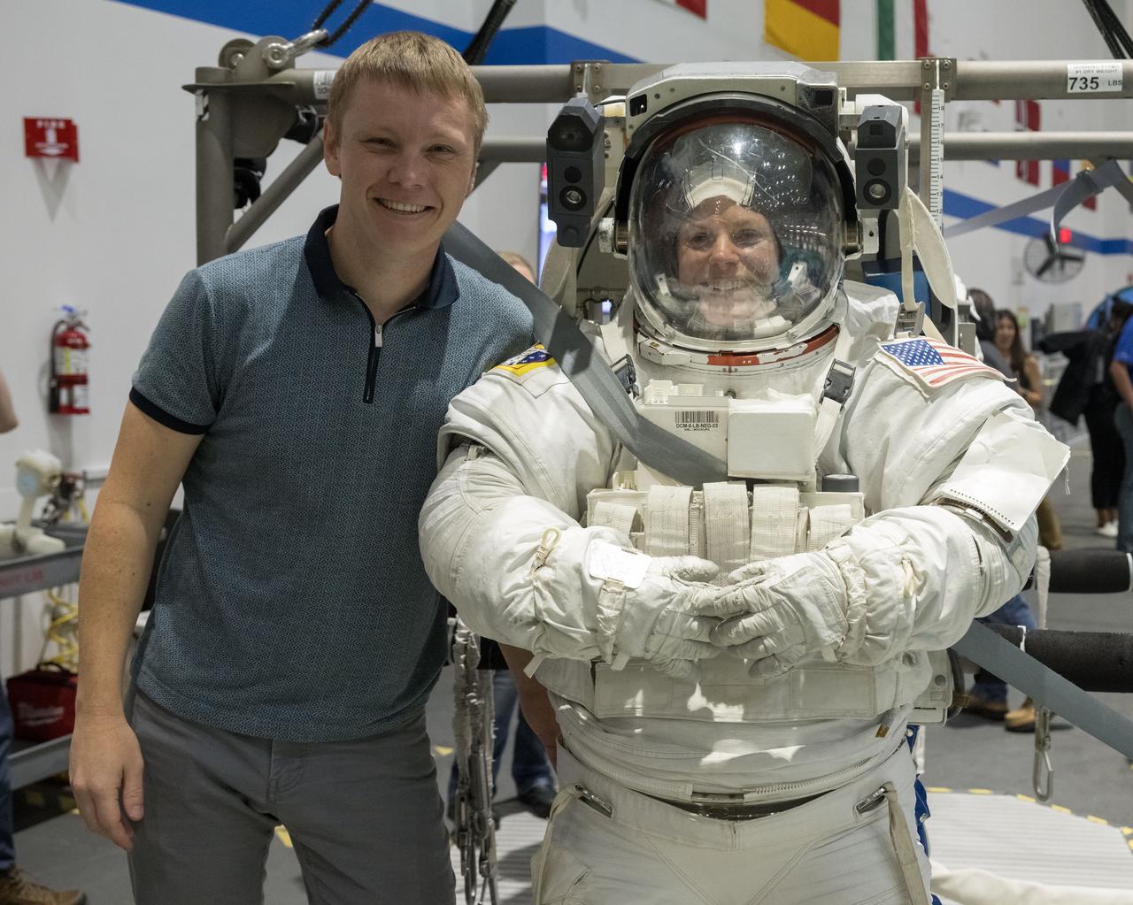 jsc2023e071583 (Nov. 6, 2023) --- NASA astronaut Zena Cardman, pictured with Roscosmos cosmonaut Aleksandr Gorbunov, trains for a spacewalk at the Neutral Buoyancy Laboratory at NASA's Johnson Space Center in Houston, Texas, for the SpaceX Crew-9 mission to the International Space Station. Credit: NASA/Bill Stafford