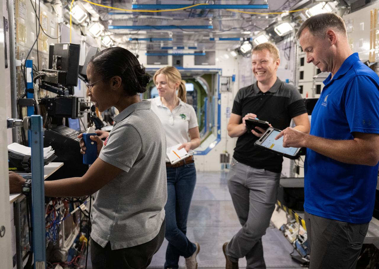 jsc2023e075402 (Nov. 7, 2023) --- (From left) NASA astronauts Stephanie Wilson, Zena Cardman, and Nick Hague, and Roscosmos cosmonaut Aleksandr Gorbunov train at the Space Vehicle Mockup Facility at NASA's Johnson Space Center in Houston, Texas, for the SpaceX Crew-9 mission to the International Space Station. Credit: NASA/James Blair