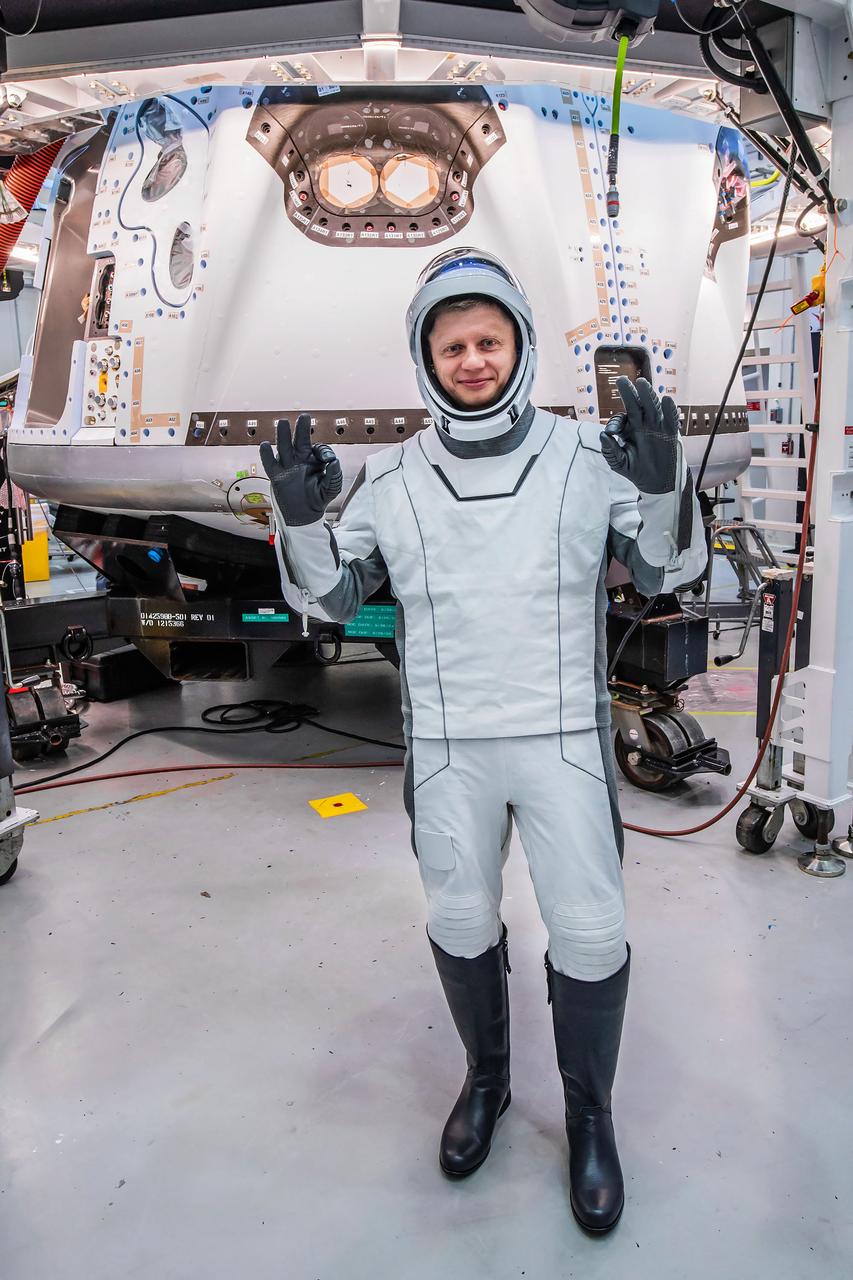 jsc2024e005940 (Jan. 12, 2024) --- Roscosmos Cosmonaut Alexander Grebenkin, mission specialist of NASA’s SpaceX Crew-8 mission, participates in the Crew Equipment Interface Test at NASA’s Kennedy Space Center in Florida to rehearse launch day activities and get a close look at the spacecraft that will take him to the International Space Station. Credit: SpaceX