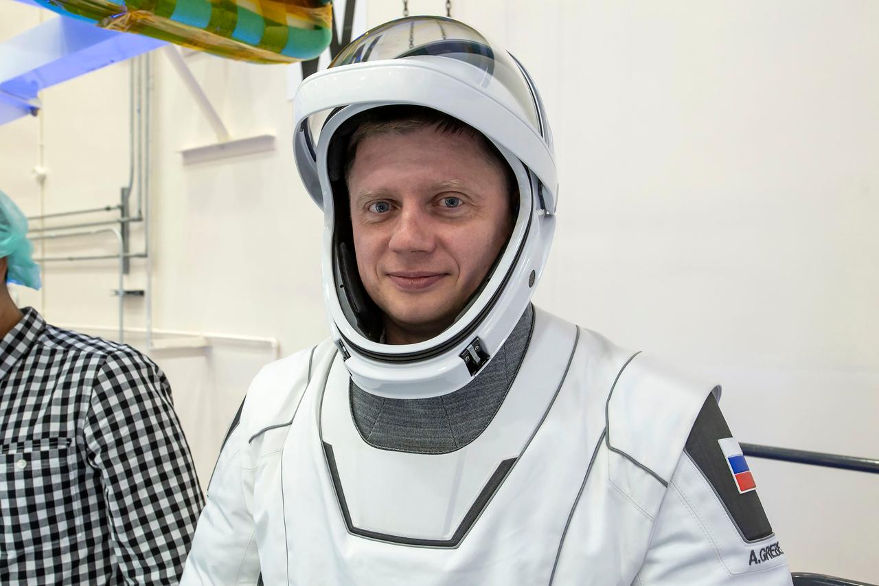 jsc2024e005948 (Jan. 12, 2024) --- Roscosmos Cosmonaut Alexander Grebenkin, mission specialist of NASA’s SpaceX Crew-8 mission, participates in the Crew Equipment Interface Test at NASA’s Kennedy Space Center in Florida to rehearse launch day activities and get a close look at the spacecraft that will take him to the International Space Station. Credit: SpaceX