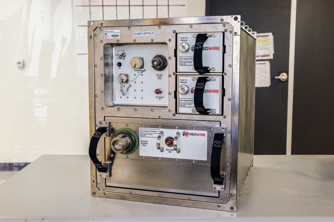 jsc2024e005973 (10/3/2023) --- The gas supply modules and production module for Redwire's Manufacturing of Semiconductors and Thin-film Integrated Coating (MSTIC) facility are pictured on the ground. Redwire's MSTIC facility is an innovative pilot program aimed at advancing the production of semiconductors, metallic films, and crystals aboard the International Space Station. Image courtesy of Redwire.