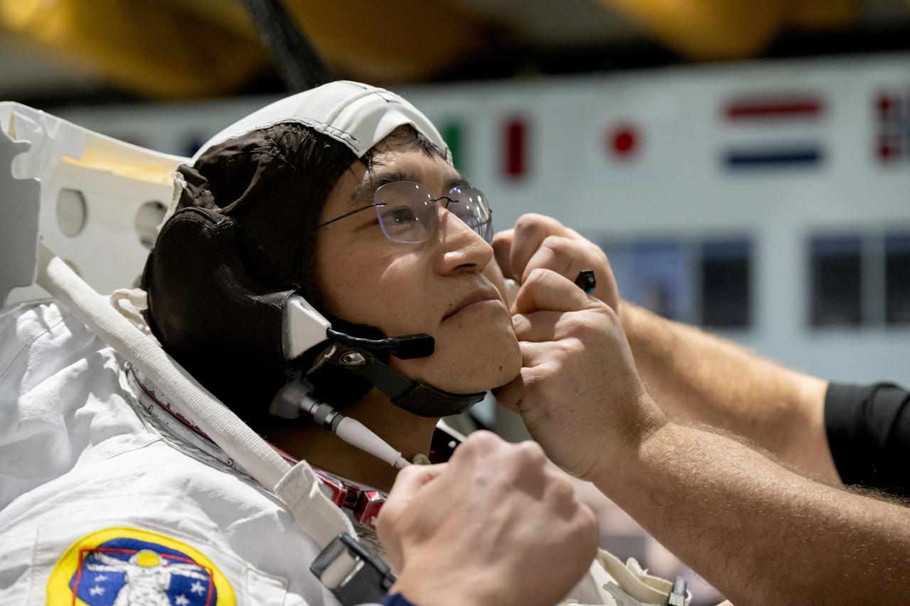 jsc2023e009107 (Jan. 22, 2024) --- JAXA (Japan Aerospace Exploration Agency) astronaut and SpaceX Crew-10 Mission Specialist Takuya Onishi prepares for spacewalk training in the Neutral Buoyancy Laboratory at NASA's Johnson Space Center.