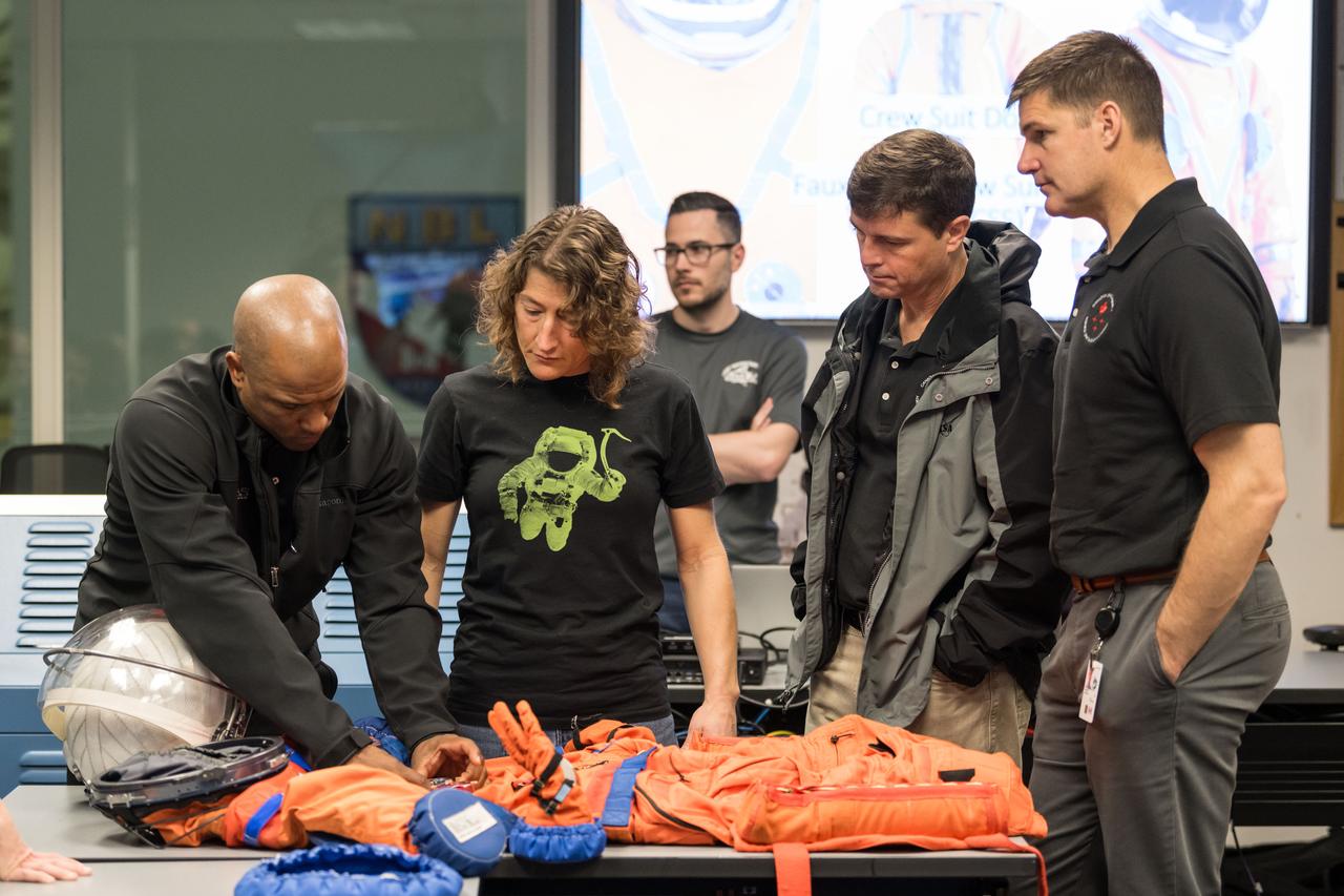 jsc2024e010142 (Jan. 23, 2024) --- The Artemis II crew is pictured during training Jan. 23 in the Neutral Buoyancy Lab at the agency’s Johnson Space Center in Houston. As part of training for their mission around the Moon next year, the first crewed flight under NASA’s Artemis campaign, the crew practiced the recovery procedures they will use when the splash down in the Pacific Ocean.