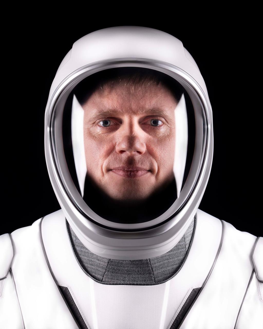jsc2024e011712 (Dec. 7, 2023) --- SpaceX Crew-8 Mission Specialist Alexander Grebenkin of Roscosmos poses for a portrait in his pressure suit at SpaceX headquarters in Hawthorne, California. Credit: SpaceX