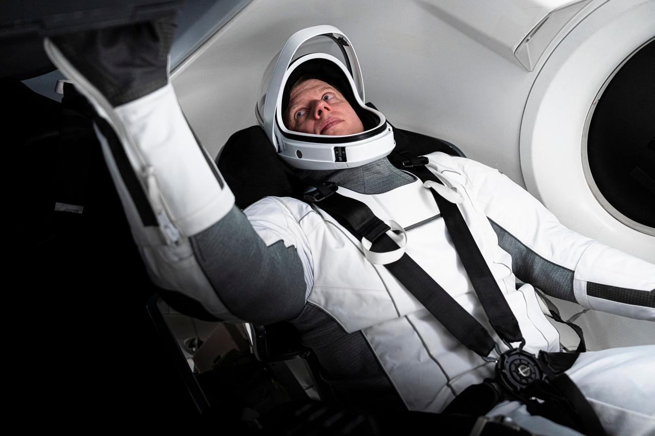 jsc2024e011729 (Dec. 6, 2023) --- Roscosmos cosmonaut and SpaceX Crew-8 Mission Specialist Alexander Grebenkin is pictured training inside a Dragon mockup crew vehicle at the company's headquarters in Hawthorne, California. Credit: SpaceX