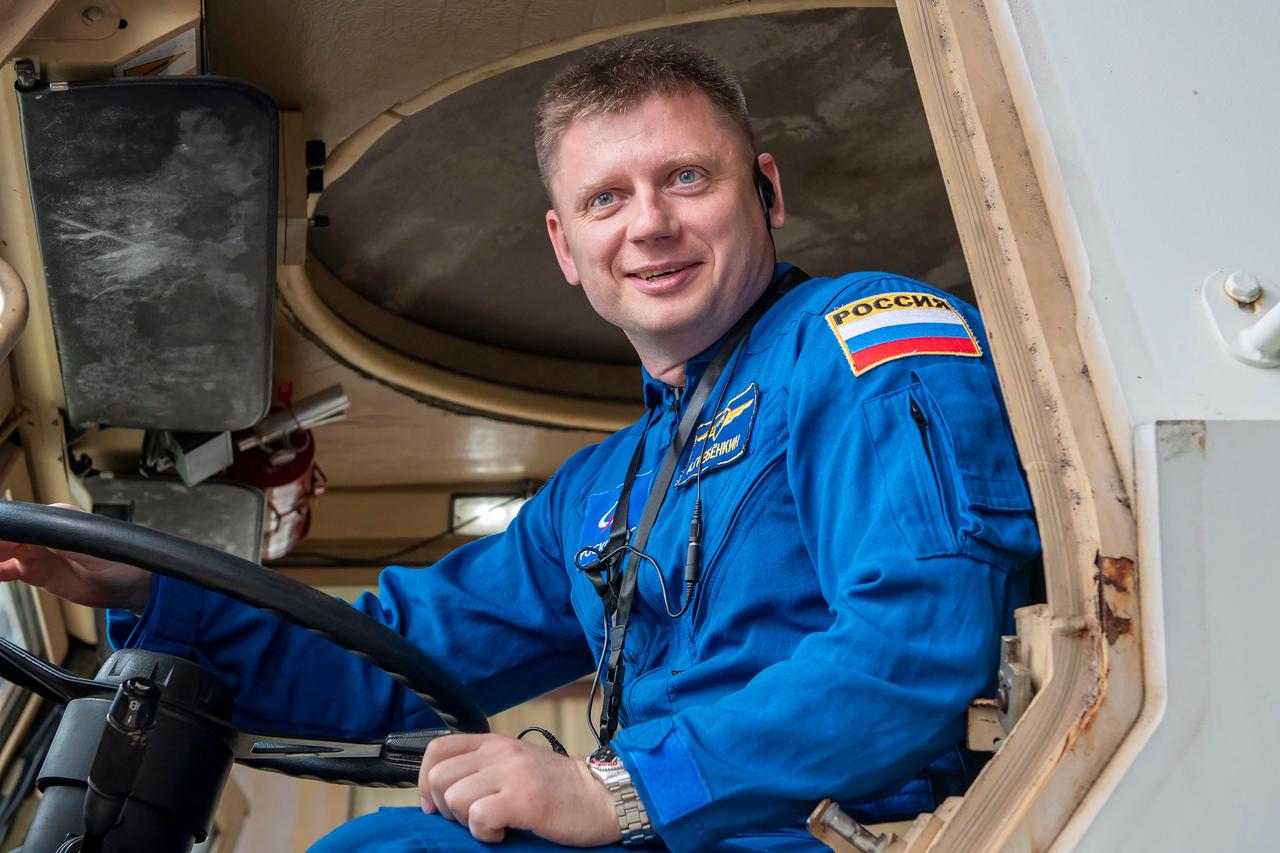 jsc2024e011750 (Oct. 12, 2023) --- SpaceX Crew-8 Mission Specialist Alexander Grebenkin poses for a photo inside an emergency egress vehicle at NASA's Kennedy Space Center's Launch Pad 39A in Florida. Crews would use the emergency egress vehicle to quickly leave the launch area in case of an emergency. Credit: SpaceX