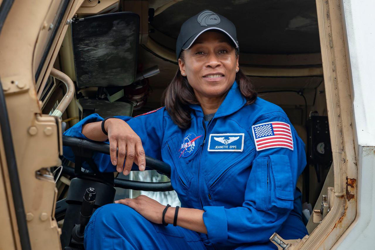 jsc2024e011753 (Oct. 12, 2023) --- NASA's SpaceX Crew-8 Mission Specialist Jeanette Epps poses for a photo inside an emergency egress vehicle at NASA's Kennedy Space Center's Launch Pad 39A in Florida. Crews would use the emergency egress vehicle to quickly leave the launch area in case of an emergency. Credit: SpaceX