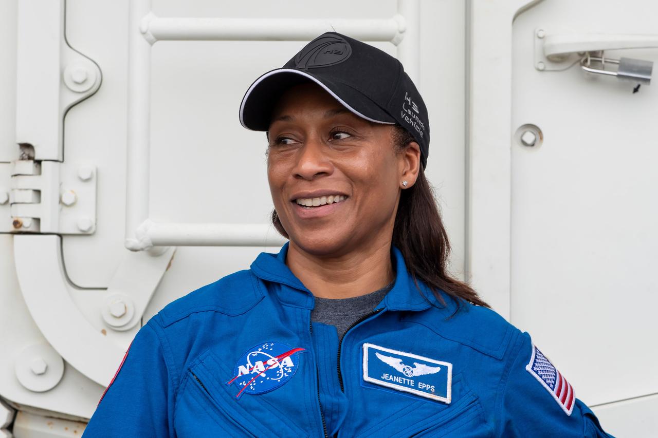jsc2024e011756 (Oct. 12, 2023) --- NASA's SpaceX Crew-8 Mission Specialist Jeanette Epps poses for a photo outside the emergency egress vehicle at NASA's Kennedy Space Center's Launch Pad 39A in Florida. Astronauts would use the emergency egress vehicle to quickly leave the launch area in the unlikely event of an emergency. Credit: SpaceX