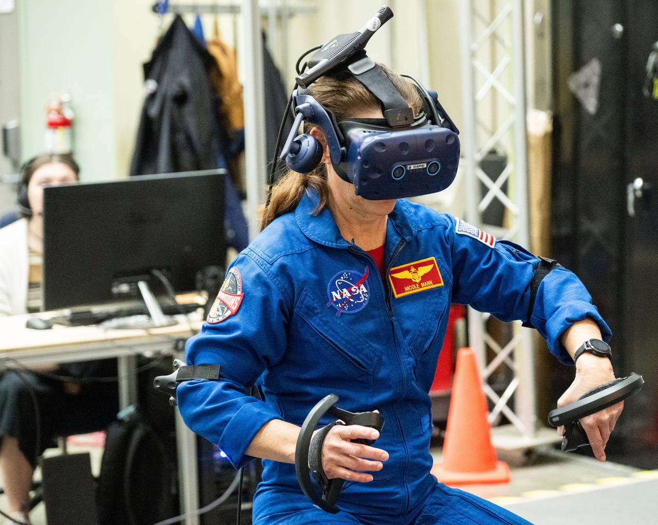 NASA astronaut Nicole Mann participates in virtual reality testing of the Gateway lunar space station to ensure its comfort and safety when astronauts live and conduct science there on future Artemis missions.   PHOTO DATE:  02-13-24 LOCATION:  Bldg. 15 - VR Lab SUBJECT:  Photographic support for Gateway Web Feature: VR Technology for Interior Gateway Training with astronaut Nicole Mann PHOTOGRAPHER:  Photo Credit: NASA / Bill Stafford