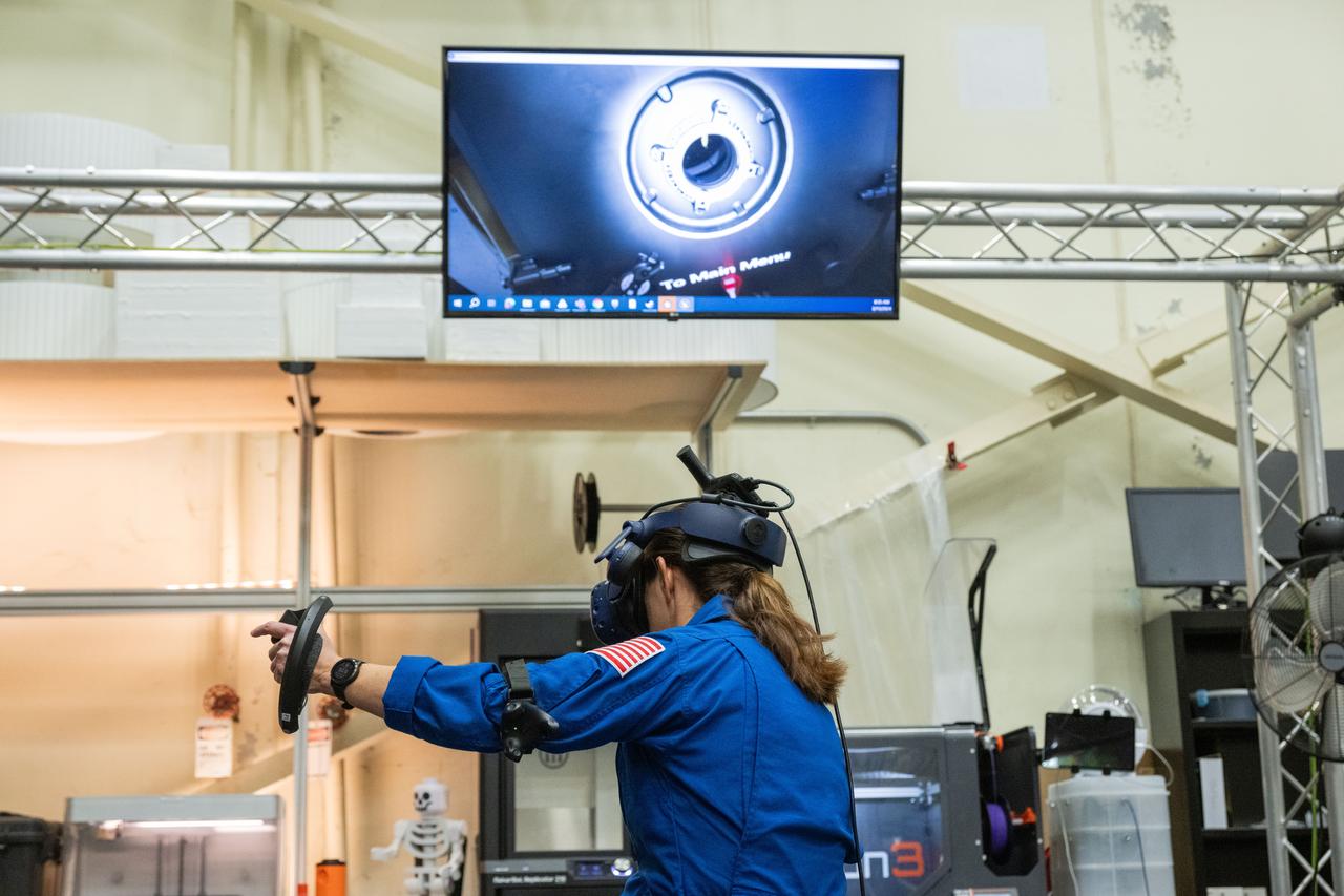 NASA astronaut Nicole Mann participates in virtual reality testing of the Gateway lunar space station to ensure its comfort and safety when astronauts live and conduct science there on future Artemis missions.   PHOTO DATE:  02-13-24 LOCATION:  Bldg. 15 - VR Lab SUBJECT:  Photographic support for Gateway Web Feature: VR Technology for Interior Gateway Training with astronaut Nicole Mann PHOTOGRAPHER:  Photo Credit: NASA / Bill Stafford
