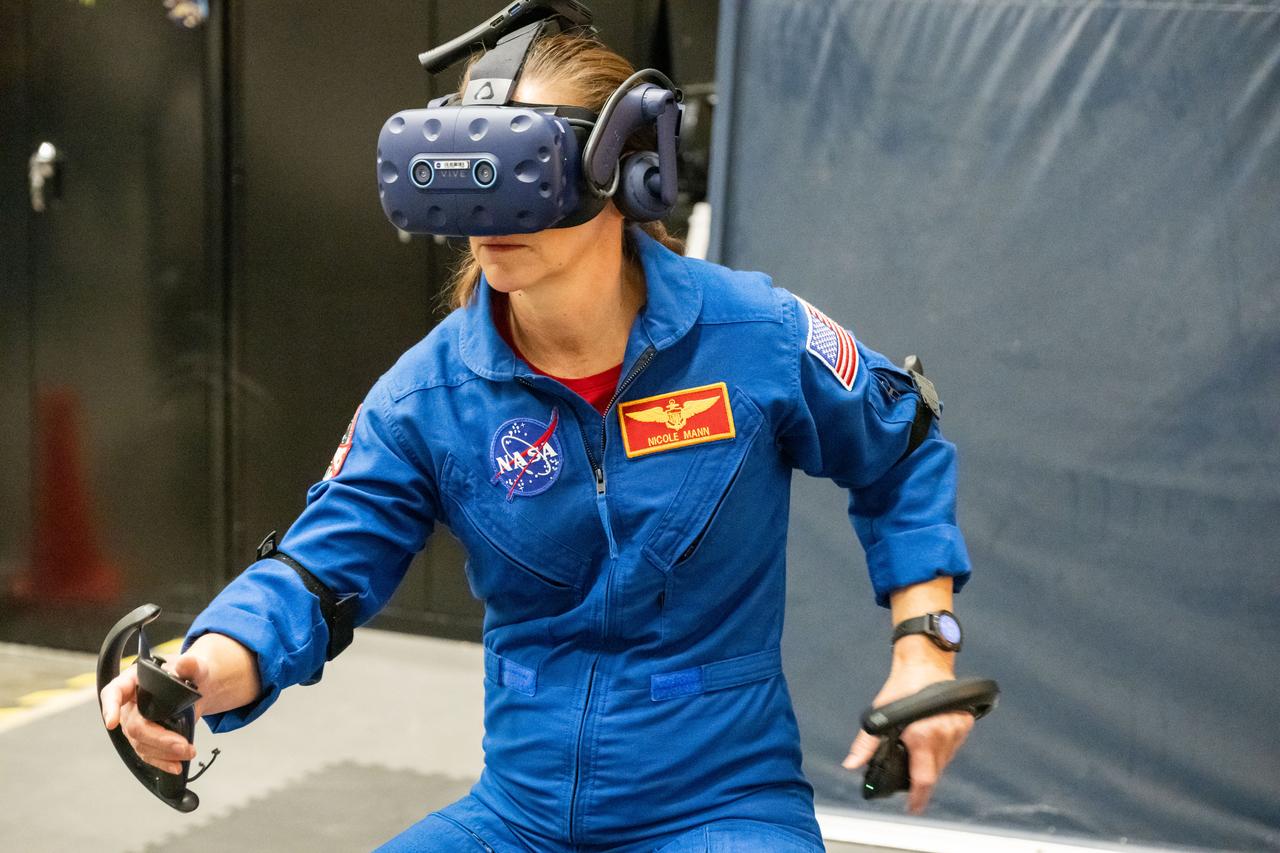 NASA astronaut Nicole Mann participates in virtual reality testing of the Gateway lunar space station to ensure its comfort and safety when astronauts live and conduct science there on future Artemis missions.   PHOTO DATE:  02-13-24 LOCATION:  Bldg. 15 - VR Lab SUBJECT:  Photographic support for Gateway Web Feature: VR Technology for Interior Gateway Training with astronaut Nicole Mann PHOTOGRAPHER:  Photo Credit: NASA / Bill Stafford