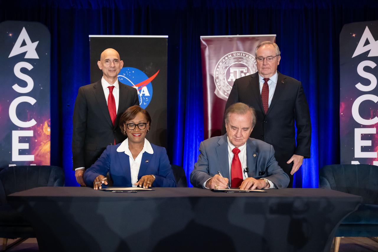 jsc2024e013569 (Feb. 15, 2024) NASA and the Texas A&M University System sign an agreement for a 240-acre Exploration Park on underutilized land at NASA’s Johnson Space Center in Houston. From left: Texas State Rep. Greg Bonnen, NASA Johnson Director Vanessa Wyche, Texas A&M University System Chancellor John Sharp, and Texas A&M University President Mark Welsh III. The announcement of the new lease agreement will allow the A&M System and others to use NASA Johnson land to create facilities for a collaborative environment that increases commercial access and enhances the United States’ commercial competitiveness in the space and aerospace industries. The announcement took place at the AIAA-hosted Ascend Texas (ASCENDxTexas) Conference at South Shore Harbour Conference Center.