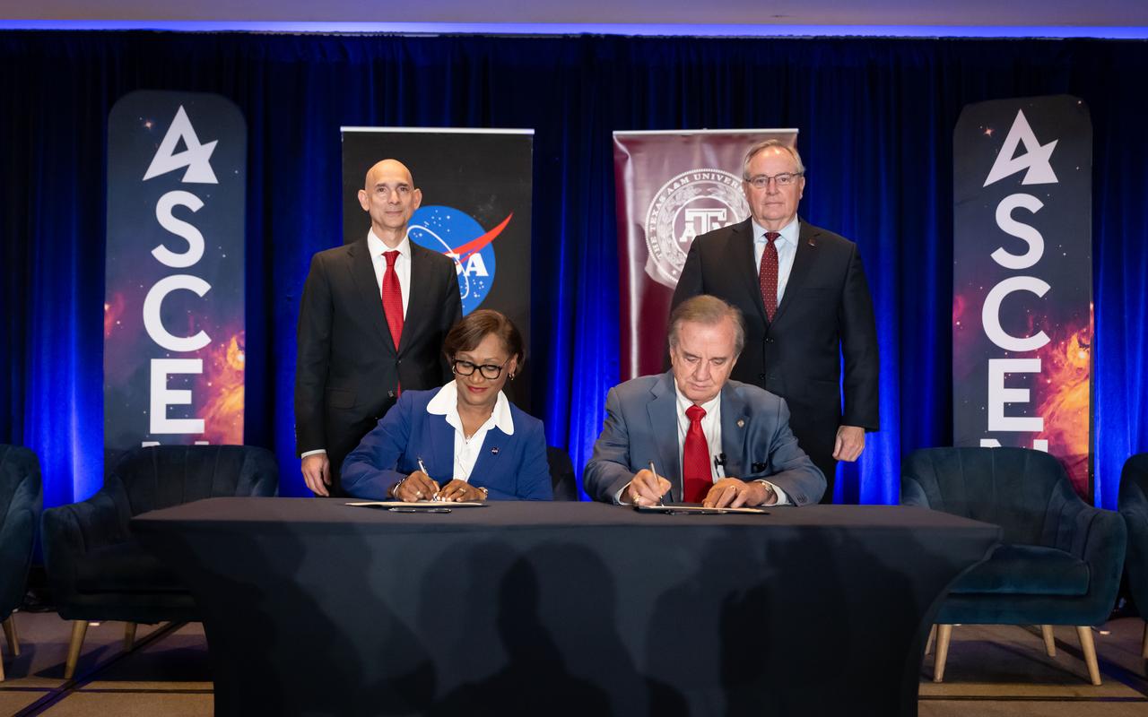 jsc2024e013573 (Feb. 15, 2024) NASA and the Texas A&M University System sign an agreement for a 240-acre Exploration Park on underutilized land at NASA’s Johnson Space Center in Houston. From left: Texas State Rep. Greg Bonnen, NASA Johnson Director Vanessa Wyche, Texas A&M University System Chancellor John Sharp, and Texas A&M University President Mark Welsh III. The announcement of the new lease agreement will allow the A&M System and others to use NASA Johnson land to create facilities for a collaborative environment that increases commercial access and enhances the United States’ commercial competitiveness in the space and aerospace industries. The announcement took place at the AIAA-hosted Ascend Texas (ASCENDxTexas) Conference at South Shore Harbour Conference Center.