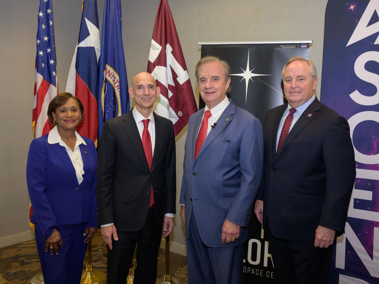 jsc2024e013586 (Feb. 15, 2024) NASA and the Texas A&M University System sign an agreement for a 240-acre Exploration Park on underutilized land at NASA’s Johnson Space Center in Houston. From left: NASA Johnson Director Vanessa Wyche, Texas State Rep. Greg Bonnen, Texas A&M University System Chancellor John Sharp, and Texas A&M University President Mark Welsh III. The announcement of the new lease agreement will allow the A&M System and others to use NASA Johnson land to create facilities for a collaborative environment that increases commercial access and enhances the United States’ commercial competitiveness in the space and aerospace industries. The announcement took place at the AIAA-hosted Ascend Texas (ASCENDxTexas) Conference at South Shore Harbour Conference Center.