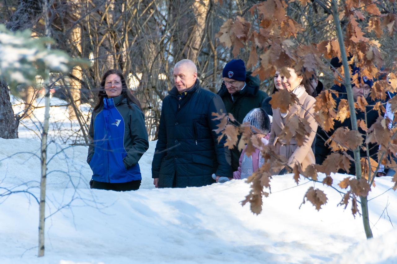 jsc2024e018306 (March 6, 2024) --- Soyuz MS-25 crew members (from left) NASA astronaut Tracy Dyson, Roscosmos cosmonaut Oleg Novitskiy, and Belarus spaceflight participant Marina Vasilevskaya are pictured before departing the Gagarin Cosmonaut Training Center in Star City, Russia, for the Baikonur Cosmodrome in Kazakhstan. The trio is in final training for its mission launching aboard the Soyuz MS-25 spacecraft to the International Space Station. Credit: GCTC