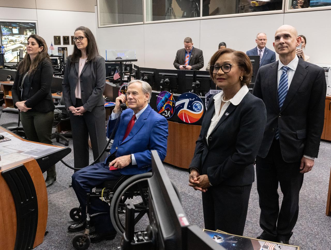 jsc2024e022823 March 26, 2024 -- NASA’s Johnson Space Center in Houston hosted a Tuesday, March 26, visit by Texas Governor Greg Abbott, who visited NASA’s Mission Control Center, spoke with native Texan and NASA astronaut Loral O'Hara aboard the International Space Station, and introduced the new members of the Texas Space Commission. Abbott was joined by NASA Johnson Space Center Director Vanessa Wyche, Texas House Speaker Dade Phelan, Texas Representative Greg Bonnen and other state and space industry leaders.