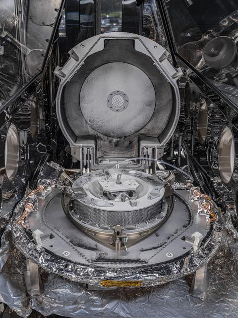 NASA image: OSIRIS-REx sample canister with lid open 