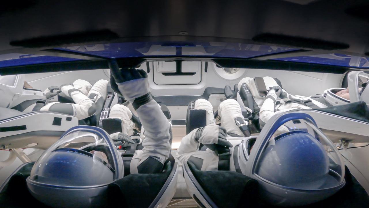 jsc2024e024941 (March 25, 2024) --- The crew of NASA's SpaceX Crew-9 mission to the International Space Station trains inside the Dragon spacecraft simulator at the company's headquarters in Hawthorne, California. Credit: SpaceX
