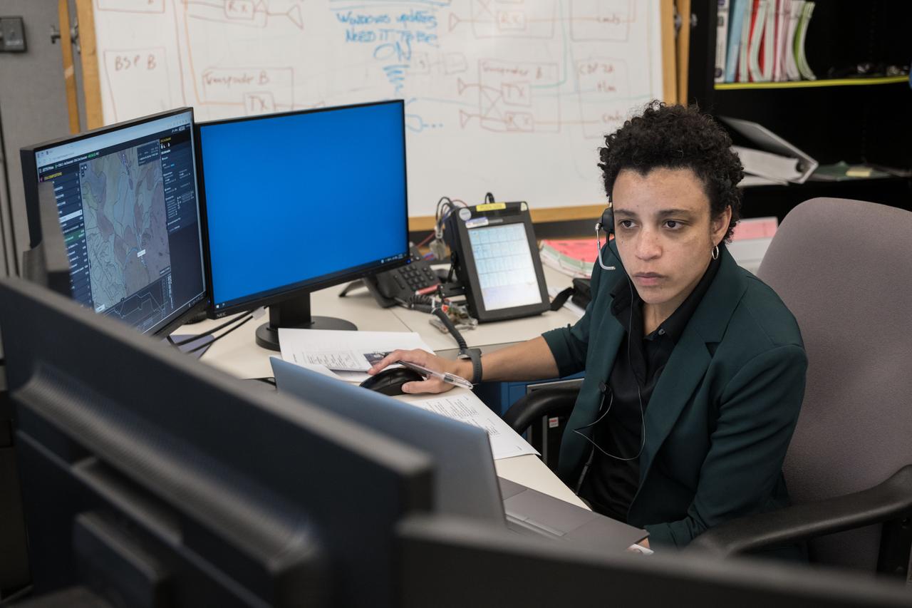 NASA astronaut Jessica Watkins served as the Ground IV for the JETT 5 field test and was the sole point of communications to NASA astronauts Andre Douglas and Kate Rubins who performed simulated moonwalks in the Arizona desert. JETT 5 was a week-long field test in the lunar-like landscape of San Francisco Volcanic Field near Flagstaff, Arizona while a team of flight controllers and scientists at Johnson monitor and guide their activities. Credit: NASA/Robert Markowitz