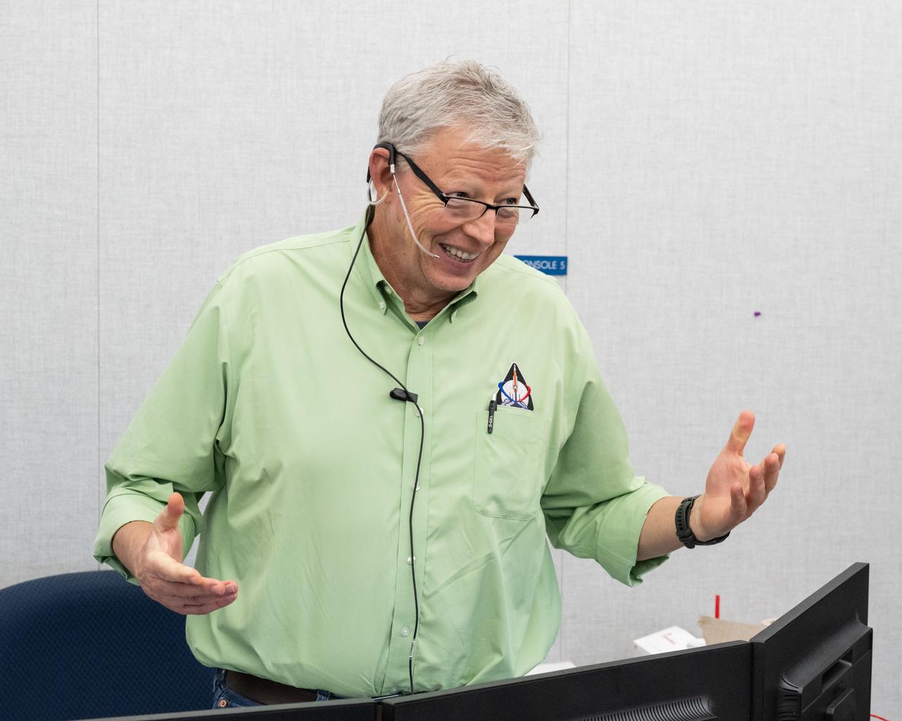 Chief training officer John Ray works in the flight control support room during the JETT 5 field test. JETT 5 was a week-long field test in the lunar-like landscape of San Francisco Volcanic Field near Flagstaff, Arizona while a team of flight controllers and scientists at Johnson monitor and guide their activities. Credit: NASA/James Blair