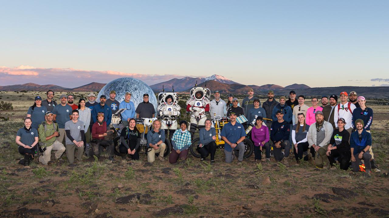 6. The Joint Extravehicular Activity and Human Surface Mobility Test Team poses for a group photo in Northern Arizona after a week-long field test consisting of four simulated moonwalks and six advanced technology runs.   Credit: NASA/Josh Valcarcel 