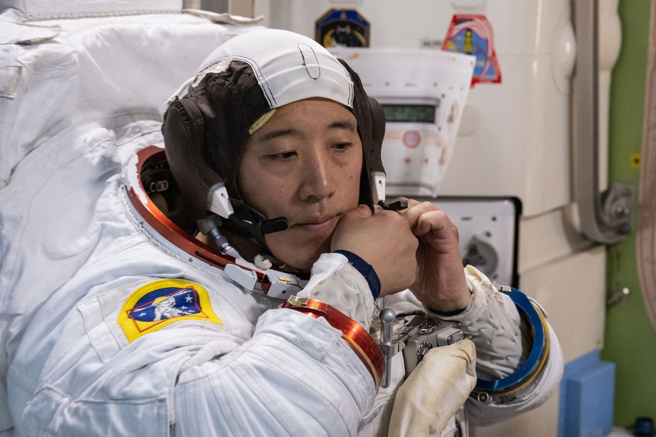 jsc2024e035666 (May 17, 2024) --- NASA astronaut and Soyuz MS-27 crew member Jonny Kim completes spacewalk preparation training inside the International Space Station mockup at Johnson Space Center.