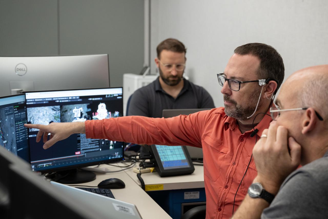 Ben Feist, software engineer on the Extravehicular Activity Mission System Software (EMSS) team, uses the suite of software he and other members of the Astromaterials Research and Exploration Science (ARES) division at NASA's Johnson Space Center in Houston developed to plan and monitor spacewalks. The JETT 5 field test was the first time this software was fully integrated into a simulated mission, supporting both science and mission control operations. JETT 5 was a week-long field test conducted in the lunar-like landscape of the San Francisco Volcanic Field near Flagstaff, Arizona, with a team of flight controllers and scientists at Johnson monitoring and guiding the activities.  Credit: NASA/Helen Arase Vargas