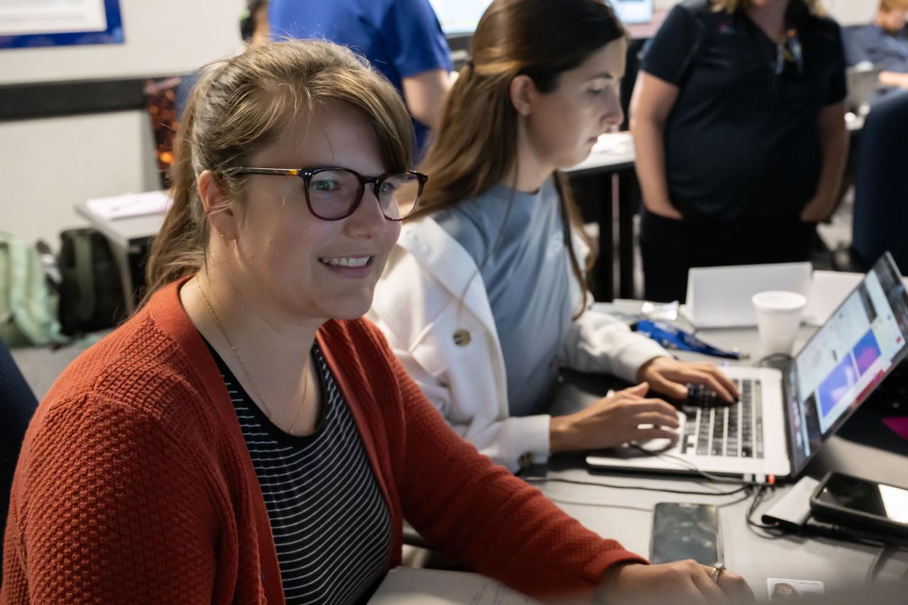 Marie Henderson, from NASA’s Goddard Space Flight Center, foreground, and Ariel Deutsch, from NASA Ames, follow the geology traverses during the JETT 5 field test. JETT 5 was a week-long field test in the lunar-like landscape of San Francisco Volcanic Field near Flagstaff, Arizona while a team of flight controllers and scientists at Johnson monitor and guide their activities.  Credit: NASA/Helen Arase Vargas