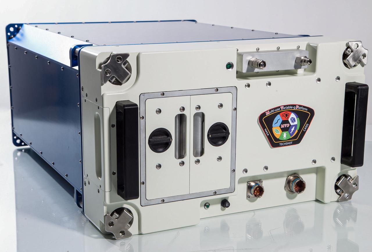 jsc2024e036958 (7/26/2016) --- The Multi-use Variable-g Platform (MVP) facility houses up to 12 modules of science. Pictured in this front view are two installed consumable modules that are used for minor environmental control, such as desiccation, CO2control, and ethylene scrubbing. Power and data connectors are also visible to provide the ground control team with health and status of the unit. Image courtesy of Grant Vellinger, Redwire.