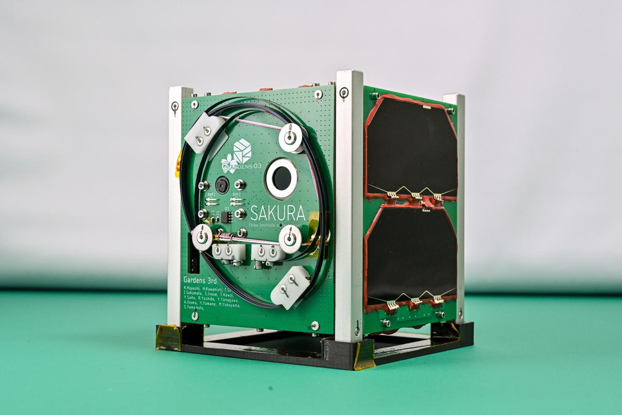 jsc2024e043926 (7/10/2024) --- Overall image of the SAKURA Flight Module. SAKURA is a 1U CubeSat, developed in the Growing Advanced and Refined space Development ENgineering succession and under the satellite (GARDENs) program by the Chiba Institute of Technology, and will deploy on the JEM [Japanese Experiment Module]-Small Satellite Orbital Deployer-31 (J-SSOD-31) mission.