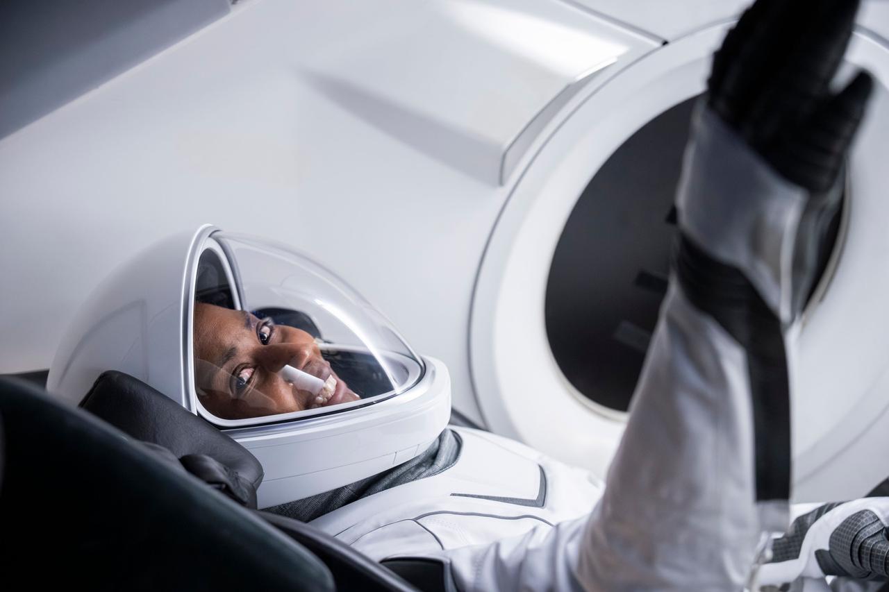 jsc2024e050137 (May 27, 2024) --- SpaceX Crew-9 Mission Specialist Stephanie Wilson trains inside a Dragon mockup crew vehicle at the company's headquarters in Hawthorne, California. Credit: SpaceX