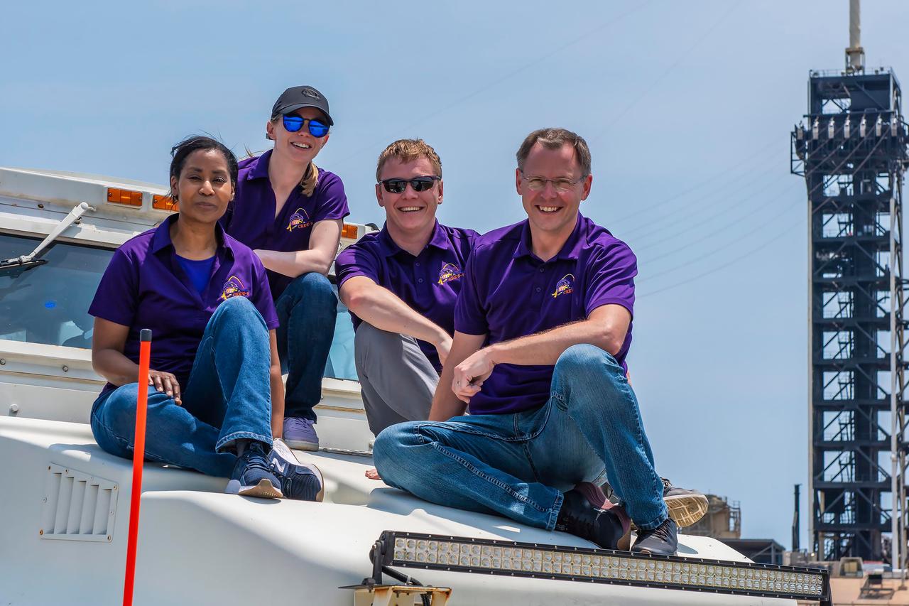 jsc2024e050144 (May 13, 2024) --- NASA’s SpaceX Crew-9 members sit atop their Mine Resistant Ambush Protected (MRAP) vehicle as part of their SpaceX crew training at Launch Complex 39A at NASA's Kennedy Space Center in Florida.  From left are, Mission Specialist Stephanie Wilson from NASA; Commander Zena Cardman from NASA; Mission Spedialist Alexsandr Gorbunov from Roscosmos; and Pilot Nick Hague from NASA. Credit: SpaceX