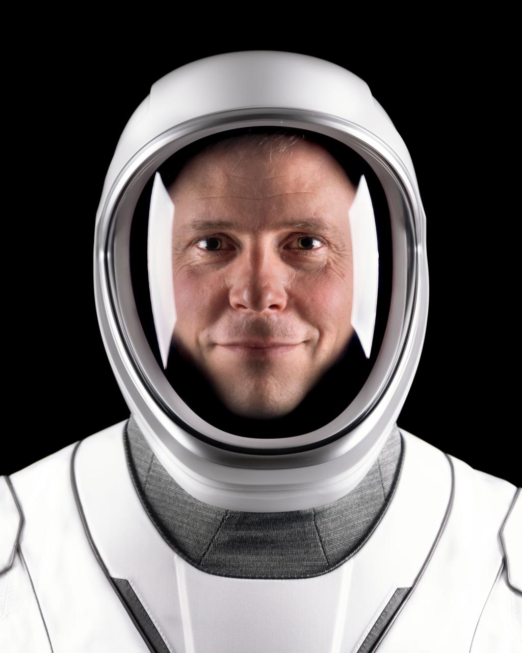 jsc2024e052332 (June 23, 2024) --- SpaceX Crew-9 Pilot Nick Hague of NASA's Commercial Crew Program poses for a portrait in his flight suit at SpaceX headquarters in Hawthorne, California. Credit: SpaceX